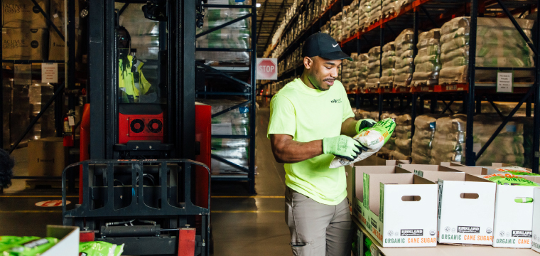 Warehouse worker sorting product