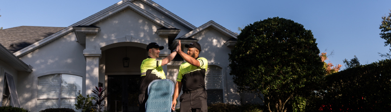 delivery crew giving a high five