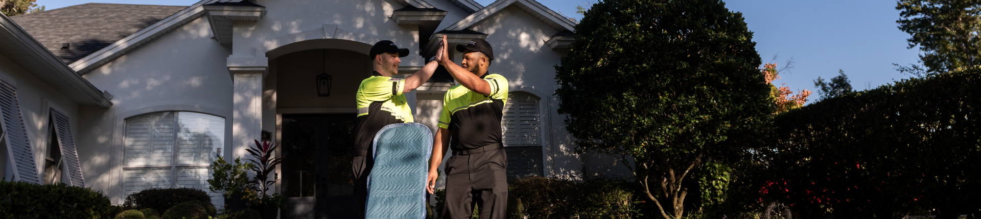 delivery crew giving a high five